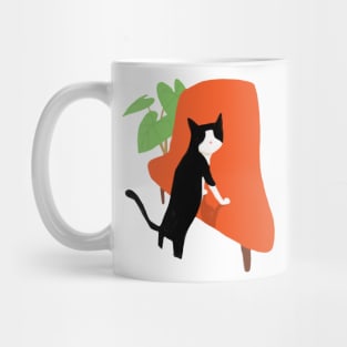 black cat stay in sofa Mug